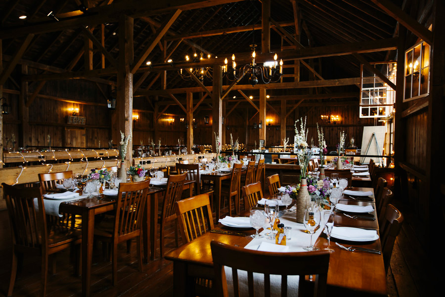 The Barn at Boyden Farm's rustic barn interior decorated for a wedding