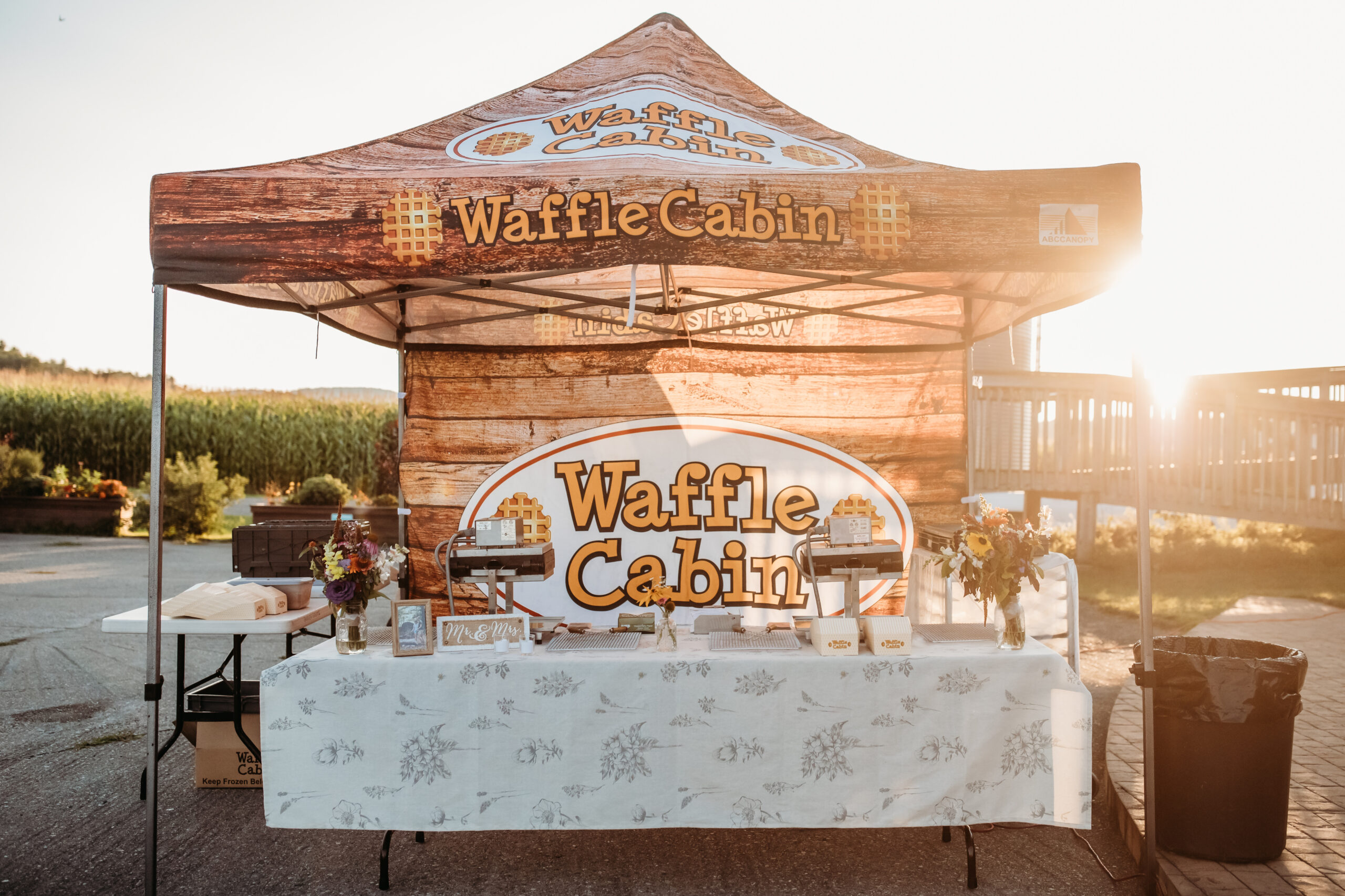 The Waffle Cabin tent outside at Jess and Greg's farmers market themed wedding reception