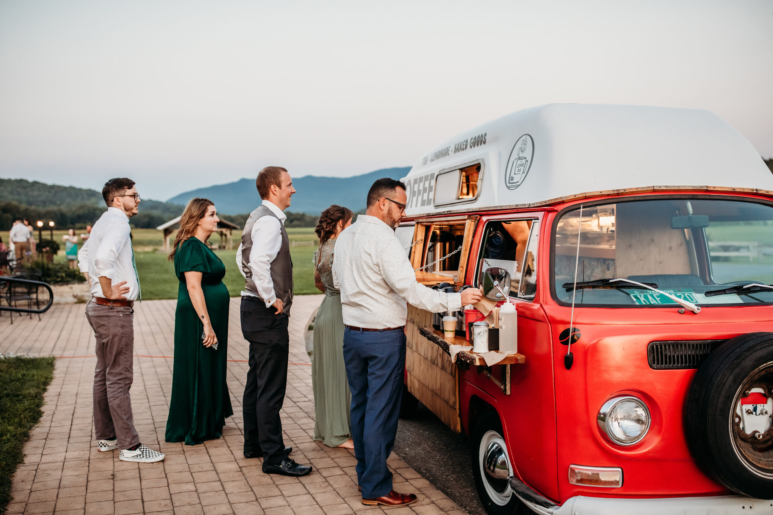 The Meef's Coffee Bus serving guests outside at the farmers market wedding reception