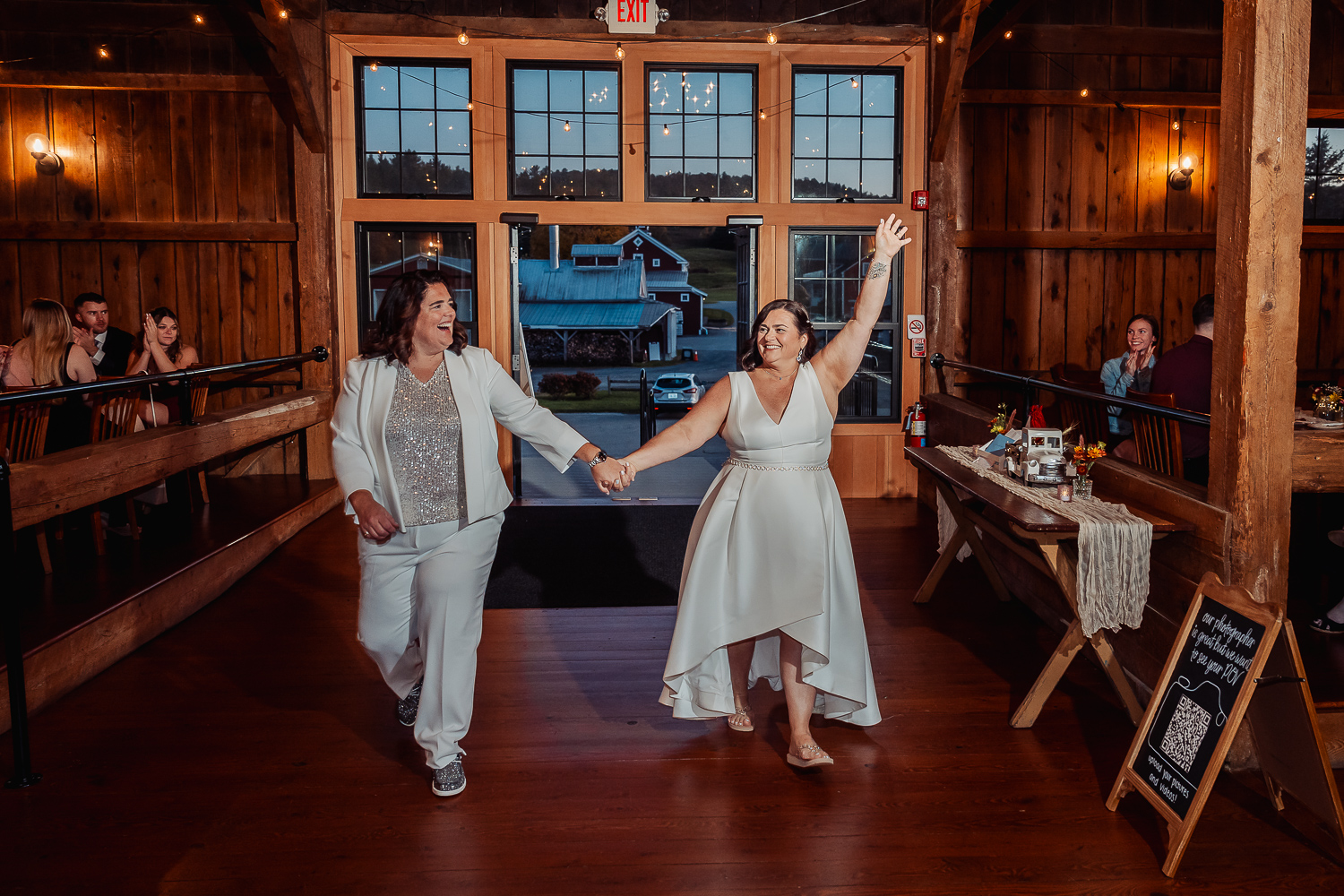 Darlene and Denise making their grand entrance into the wedding barn together
