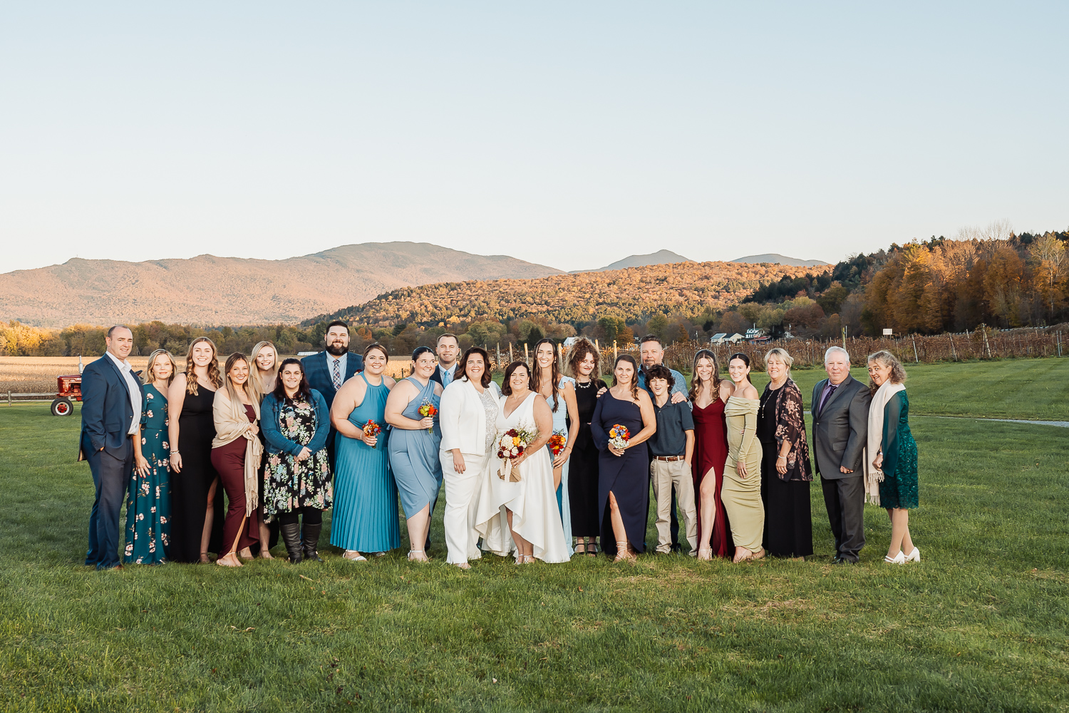 Wedding guests gathered for a picture at Darlene and Denise's outdoor October wedding